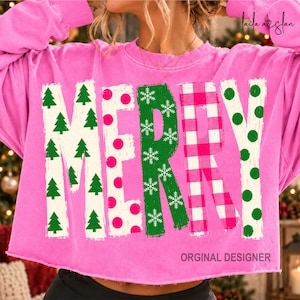 May include: A bright pink long-sleeve sweatshirt featuring the word MERRY printed across the front. Each letter has a unique pattern: green pine trees, pink polka dots, white snowflakes on green, pink and white gingham, and green polka dots.