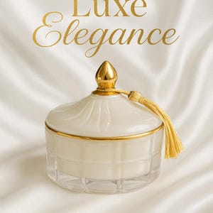 Luxe Elegance Upgrade Perfumed Velvety Dusting Powder 12oz. Comes in luxury gold glass container  adorned  with gold tassel