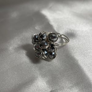Adjustable cluster statement ring