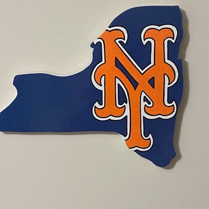 May include: A wooden cutout of the state of New York with the New York Mets logo in orange and white on a blue background.