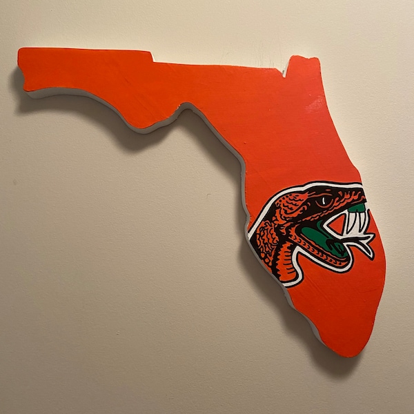 Florida  A & M  University painted - wooden sign in the shape of Florida cut out wall sign- Handpainted , comes with hook for hanging.
