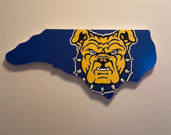 Handpainted NC  A&T -  Aggies wooden sign in the shape of North Carolina   cut out wall sign, comes with hook for hanging.