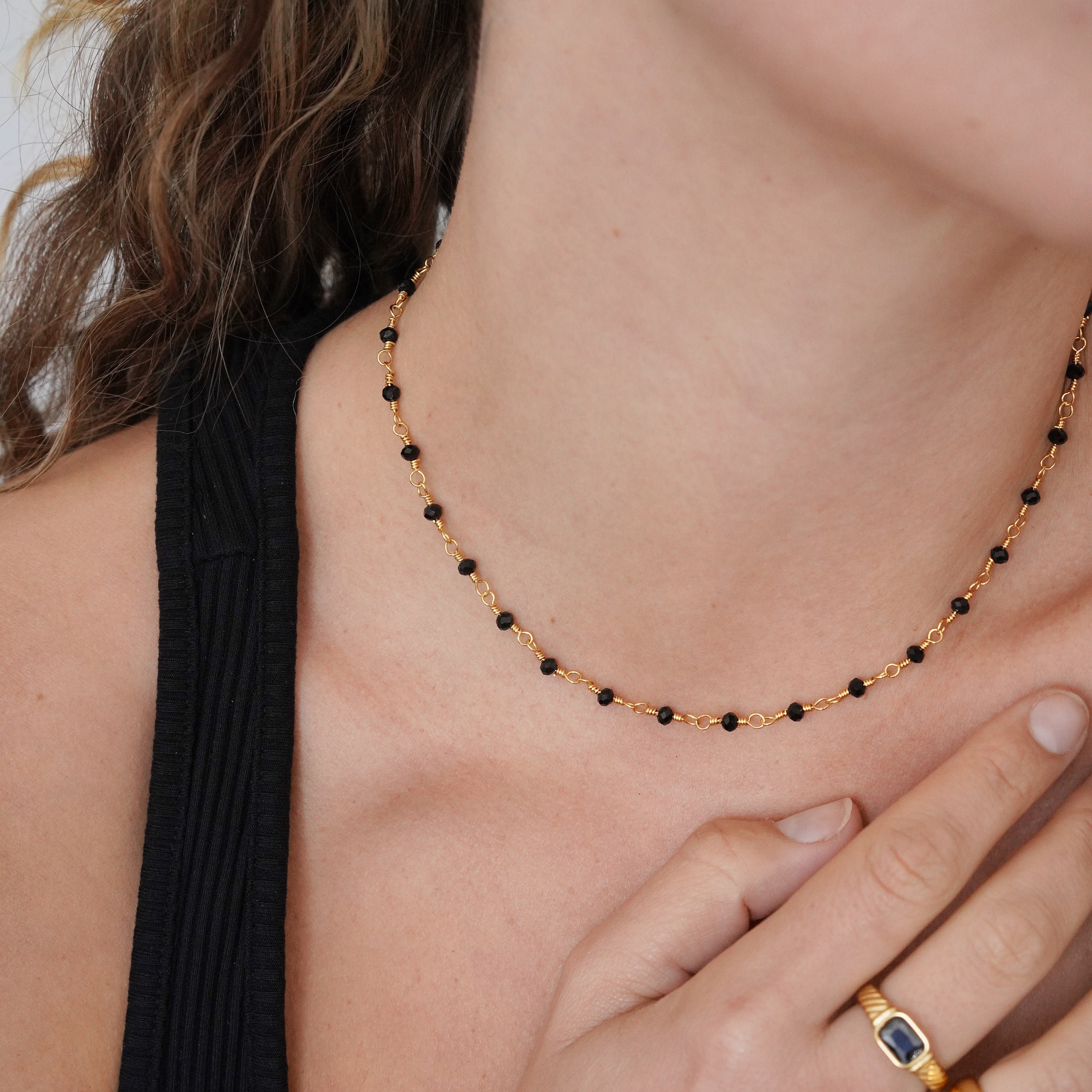 Small black beads store gold chain designs