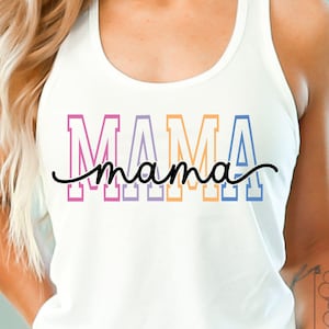 May include: White vest top featuring the word "MAMA" in colourful block letters, with a cursive "mama" underneath. The letters are outlined in pink, orange, and blue. The top is worn by a person.