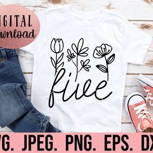 May include: A white t-shirt with a black floral design and the word "five" written in a cursive font.