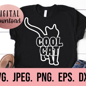 May include: Black t-shirt with a white silhouette of a cat and the text "COOL CAT" in white.