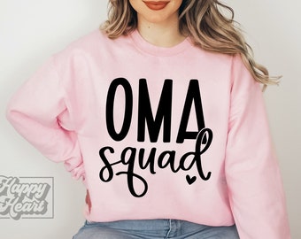May include: Pink sweatshirt with black text that reads "OMA squad" with a small heart.
