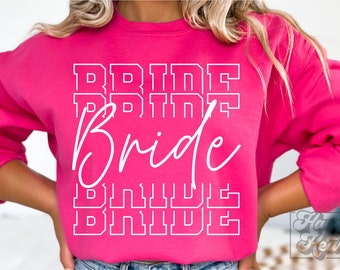 May include: A pink sweatshirt with the text "BRIDE" in white outlined letters. The word "Bride" is written in cursive in white.