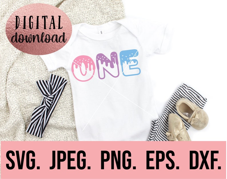 May include: A white onesie with the word "ONE" in pink, purple, and blue with white frosting and sprinkles. The onesie is on a white background with a black and white striped headband and a pair of gold shoes.