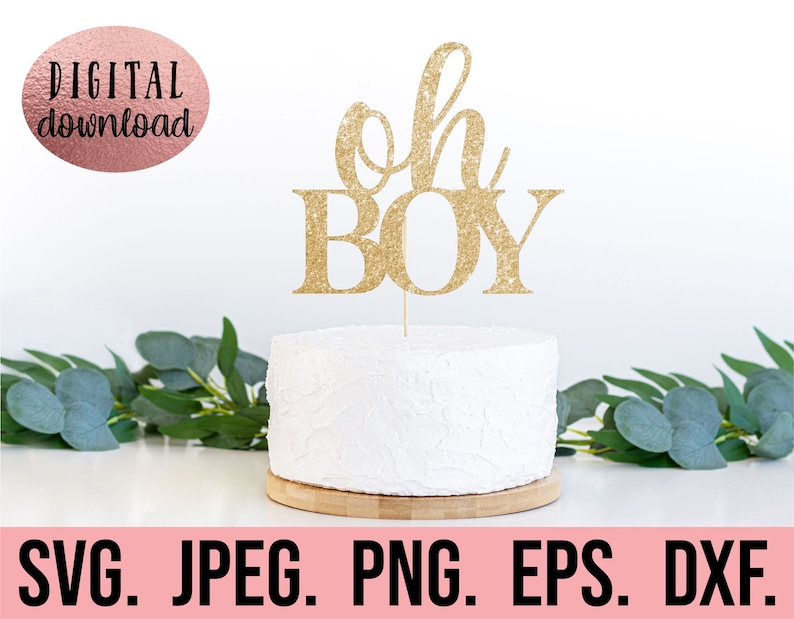 May include: Gold glitter cake topper with the text "Oh Boy" on a white cake. The cake is on a wooden base. The image is on a white background.