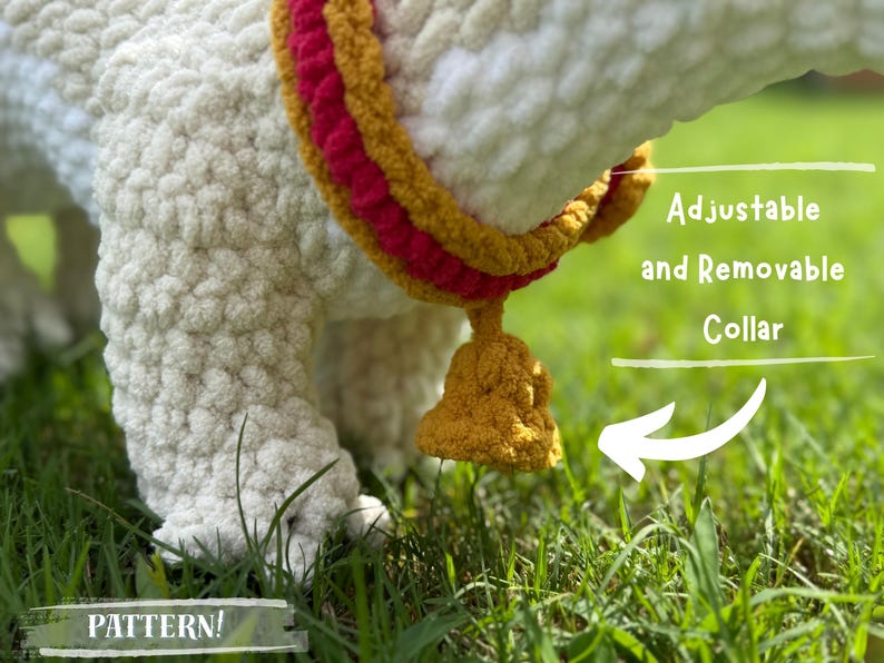 May include: Close-up of a white, textured, crocheted llama or alpaca leg with an adjustable and removable collar. The collar is yellow, red, and gold. The text "PATTERN!" is at the bottom.