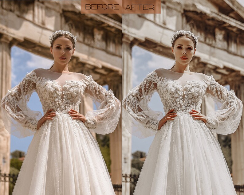 May include: A bride wearing a white wedding dress with intricate floral embroidery and a long veil. The dress has a fitted bodice and a flowing skirt. The bride is standing in front of a stone archway.