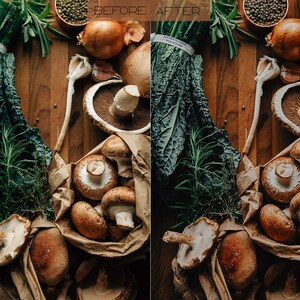 May include: A close-up of a brown paper bag filled with fresh mushrooms. The bag is sitting on a wooden table with other ingredients, including kale, rosemary, garlic, and onions.