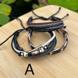 Set of 2 or 3 wristbands on adjustable cord. Surfer jewellery, leather bracelet, cord bracelet, unisex bracelet,men’s bracelet, wristbands .