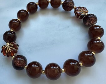 Handmade Brown Glass Beaded Bracelet | Maple Leaf Accent