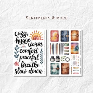 May include: Watercolor stickers with the words "cozy, hygge, warm, comfort, peaceful, breathe, slow down" and illustrations of notebooks, pens, washi tape, and ink bottles. The text "Sentiments & More" is at the top.