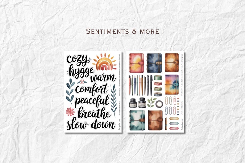May include: Watercolor stickers with the words "cozy, hygge, warm, comfort, peaceful, breathe, slow down" and illustrations of notebooks, pens, washi tape, and ink bottles. The text "Sentiments & More" is at the top.