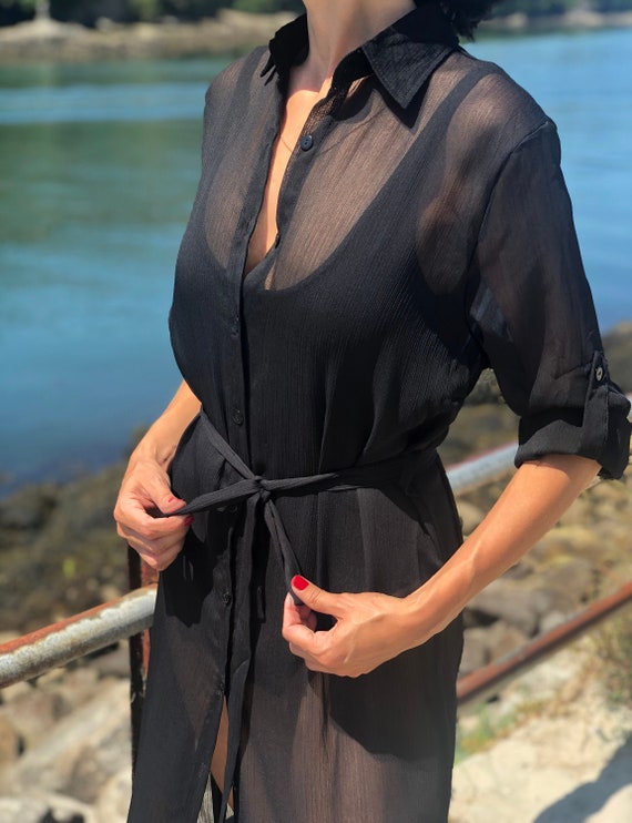 Black Dress on Sheer Fabric. Kaftan 