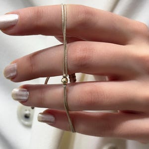 Bransoletka ze sznurka ze złota 14k z diamentowym szlifem, z motywem Kabały
