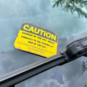 Caution parking sticker, Congrats to parking lot bad driver. Award of the day