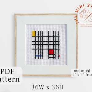 May include: A framed cross stitch pattern of a geometric design with black lines, a yellow square, a red square, and a blue line. The pattern is 36 stitches wide by 36 stitches high and is mounted in a 4 inch by 4 inch frame. The frame is light brown wood with a white mat.