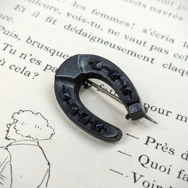 Tiny antique horseshoe gutta percha brooch | Victorian mourning jewelry