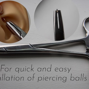 May include: A stainless steel piercing tool with a scissor-like design, featuring a rounded handle and pointed tips. The image includes a close-up of the tool in use, along with the text: "For quick and easy installation of piercing balls."