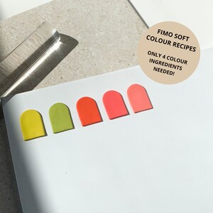 May include: A white notebook with five colorful, arched-top polymer clay pieces in yellow, green, orange, coral, and pink. A clear acrylic roller is in the background. The text on the image reads "FIMO SOFT COLOUR RECIPES ONLY 4 COLOUR INGREDIENTS NEEDED!"