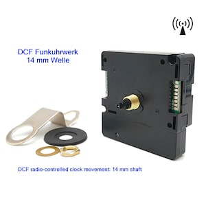 Può includere: Un movimento di orologio radiocomandato nero con un albero da 14 mm, corredato di hardware di montaggio. Il testo recita "DCF Funkuhrwerk 14 mm Welle" e "DCF radio-controlled clock movement: 14 mm shaft."