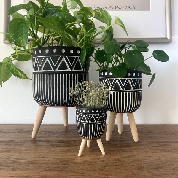 Abstract Cement Planter Pots on Tripod Wood Stands