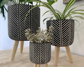 Herring Bone Cement Tripod Planter Pots on Wood Stands