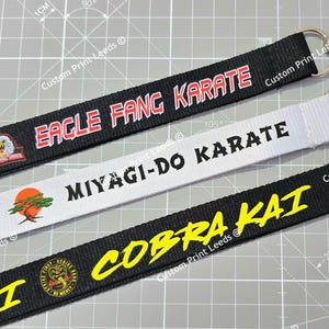 Smycz Cobra Kai, Miyagi Do lub Eagle Fang - dostępna pojedynczo lub w zestawie - sprawdź!