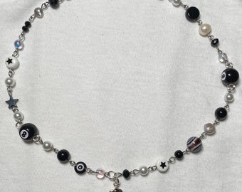 The Garden inspired black and white beaded choker necklace with jester charm, dice beads and 8 ball beads