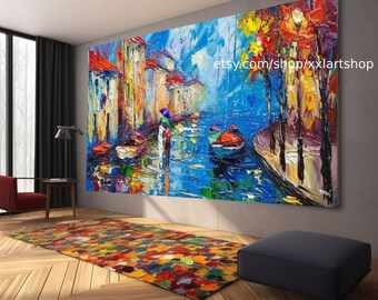 May include: A colorful, abstract painting of a cityscape with buildings, water, and boats. The painting is done in a thick, impasto style, with visible brushstrokes. The colors are bright and vibrant, and the overall effect is one of energy and movement. The painting is titled "etsy.com/shop/xlartsshop".