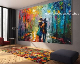May include: A colourful abstract painting of a couple walking in a forest. The painting is done in a thick impasto style, with vibrant colours and bold brushstrokes. The couple are silhouetted against a bright sunset, and the trees are painted in a variety of shades of green, blue, and yellow. The painting is signed "Aneri" in the bottom right corner.