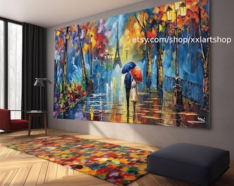 May include: A colourful painting depicting a couple walking under an umbrella on a Parisian street, with the Eiffel Tower in the background. The painting is executed in a vibrant style with bold brushstrokes and bright colours. The couple are silhouetted against the Eiffel Tower, and the street is wet from the rain. The painting is framed and hanging on a wall in a modern living room.