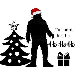 May include: A black silhouette of a Bigfoot wearing a red Santa hat stands next to a black silhouette of a Christmas tree. The text "I'm here for the Ho Ho Ho's" is written in black below the image.