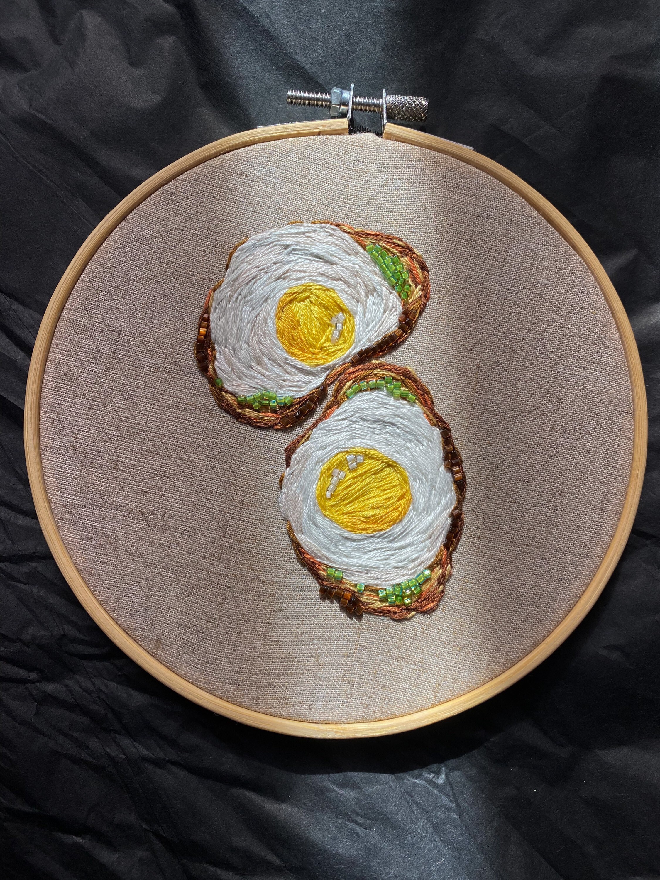 wool felt bacon and egg wall hanging in a 6 inch embroidery hoop 