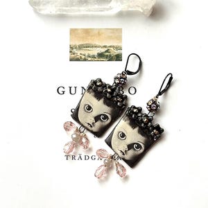 Doll & Dreams Whimsical Earrings of Nostalgic Wonder Magical Assemblage Ceramic Charms Pink Glass