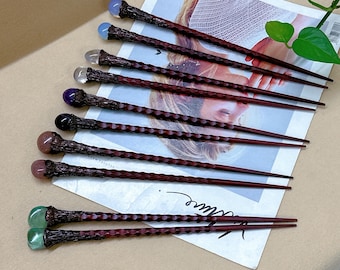 May include: A set of ten hair sticks with different colored gemstone tips. The sticks are made of dark wood with a textured finish.