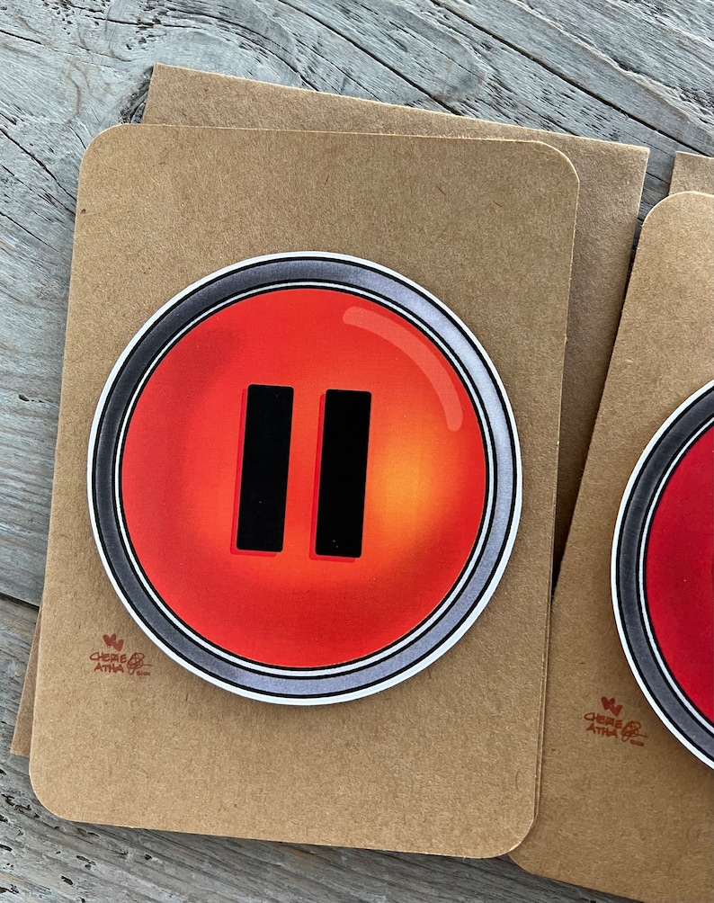 Up close of the front of the pause button card