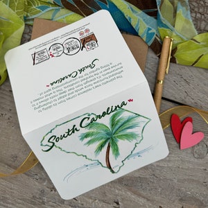 Showing the front and the back of the notecard.
