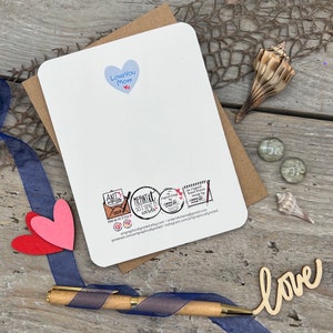 The back of the card features a light blue heart with the words, love you mom and my signature hearts. It also includes my logos at the bottom.