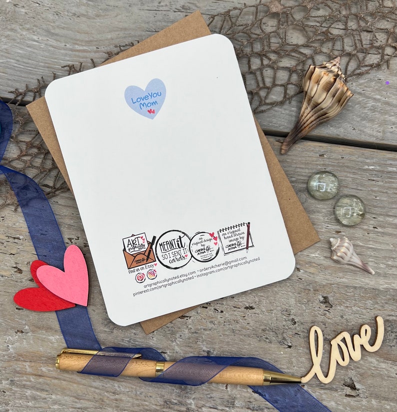 The back of the card features a light blue heart with the words, love you mom and my signature hearts. It also includes my logos at the bottom.
