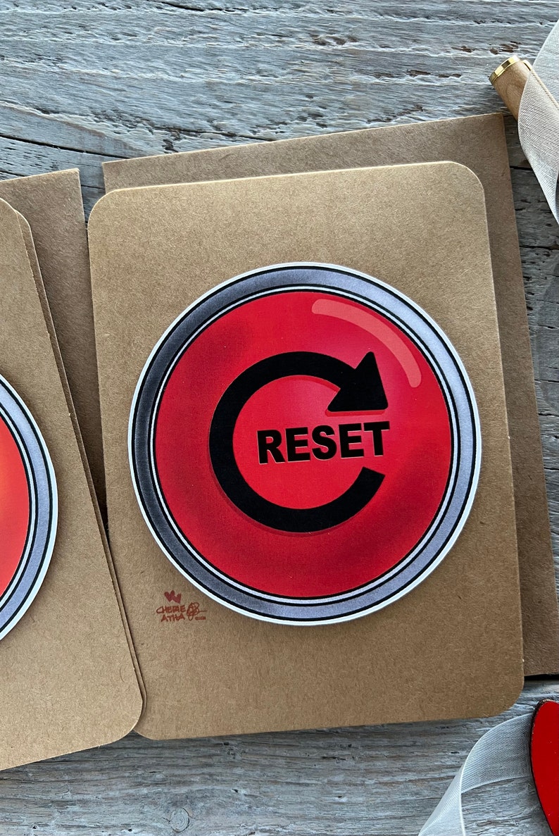 Up close of the front of the reset button card