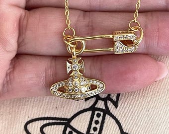 vintage saturn necklace, Vivienne Westwood necklace