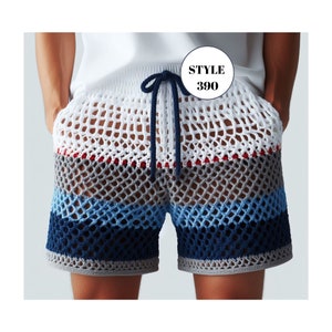 May include: Open-weave crochet shorts in white, gray, blue, and navy. The shorts have a drawstring waist and a gray trim. The text "STYLE 390" is in a white circle in the upper right corner. The shorts are a summer garment.