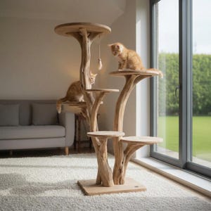 May include: A multi-level cat tree constructed from natural light-colored wood branches with several circular platforms at varying heights. Two orange tabby kittens are positioned on the platforms, and a small toy hangs from the top level.