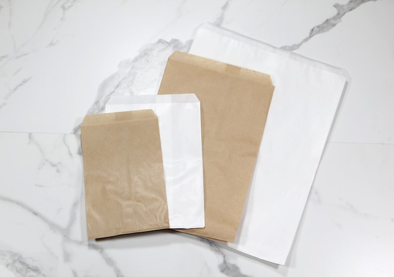 White and brown kraft paper bags