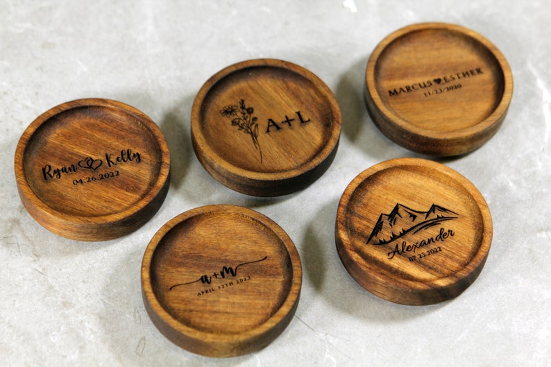 custom engraved wood ring dish with multiple designs. Engraved ring dish with initials , dates, names , mountains , hearts
